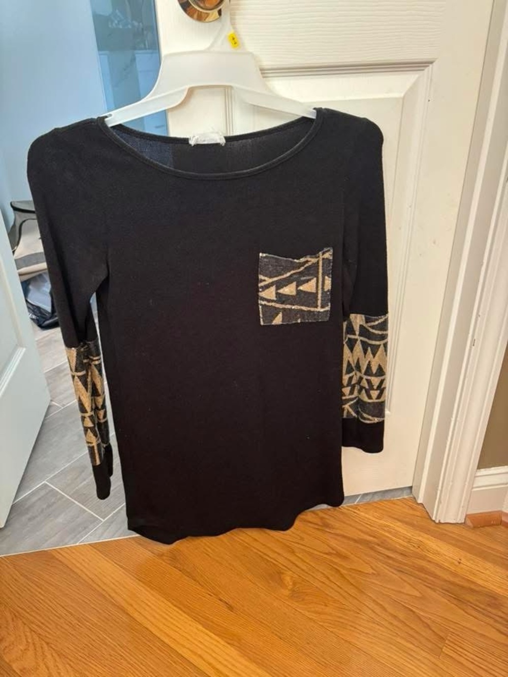 Black Long Sleeve Top with Geometric Accent Pocket and Sleeves